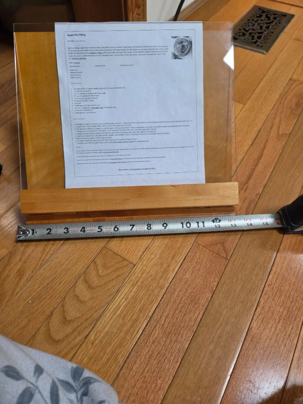 wooden cookbook stand with adjustable slant and an acrylic glass viewing shield